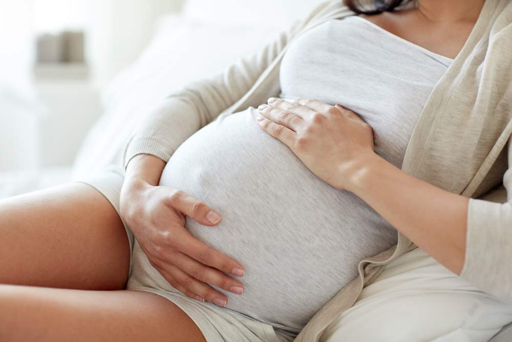 Mama Linc Pregnant Woman Holding Belly Feeling Baby Move